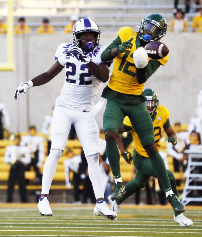 Baylor cornerback Kalon Barnes (12) breaks up a pass to TCU receiver Blair Conwright (22). Mandatory Credit: Raymond Carlin III-USA TODAY Sports